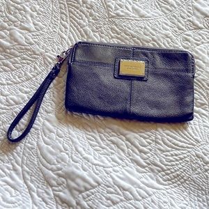 Tignanello wristlet grey silver color